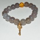 Women's 10 MM Faceted Gray Agate Golden Key Stretch Bracelet 7.10" #225