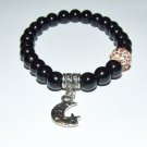 Women's 8 MM Black Onyx "sun moon and Stars" stretch bracelet 7.50"  #238