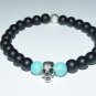 Men's 8 MM Matte Black Onyx Pewter Skull and Turquoise Stretch Bracelet 8.25"