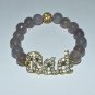 Women's 10 MM Faceted Gray Agate "BAD" Crystal Stretch Bracelet 7.50"