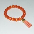 Women's 10 MM Orange Cats-Eye/Mexican Opal Mala Tassel Stretch Bracelet 7.25"