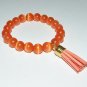 Women's 10 MM Orange Cats-Eye/Mexican Opal Mala Tassel Stretch Bracelet 7.25"