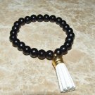 Women's 8 MM Black Onyx Suede Tassel Stretch Bracelet 7.25"