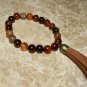 Men's 10 MM Fire Agate Buddha Head Mala Tassel Stretch Bracelet 8.0"