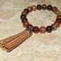 Men's 10 MM Fire Agate Buddha Head Mala Tassel Stretch Bracelet 8.0"