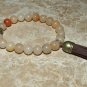 Men's 10 MM Natural Jade Mala Tassel Buddha Head Stretch Bracelet 8.0"