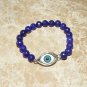 Women's 8 MM Faceted Sapphire Blue Jade Evil Eye Stretch Bracelet 7.25"