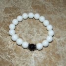 Men's 12 MM White Coral with Faceted Black Onyx Sphere Bracelet 8.10"