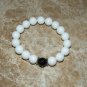 Men's 12 MM White Coral with Faceted Black Onyx Sphere Bracelet 8.10"