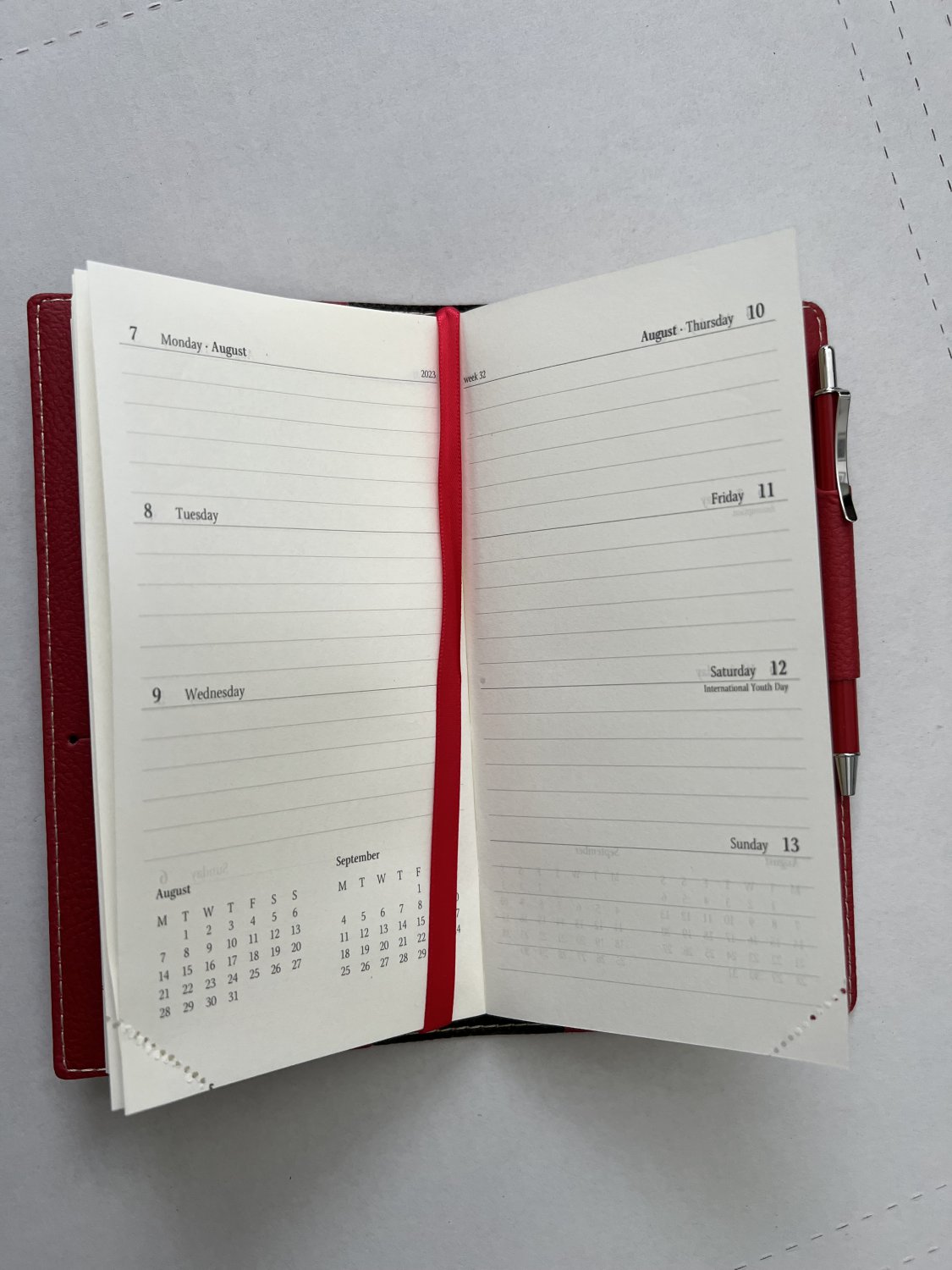 2023 Italian Bonded Leather Classique Rose Red Weekly Pocket Planner