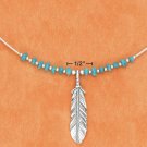 COIL NECKLACE W/ TURQUOISE NUGGETS & FEATHER