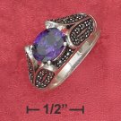 SYNTHETIC TANZANITE W/MARCASITE ENCRUSTED TAPERING BAND RING.