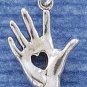 STERLING SILVER 3D HEART IN HAND CHARM