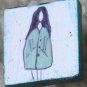 pear girl coat badge