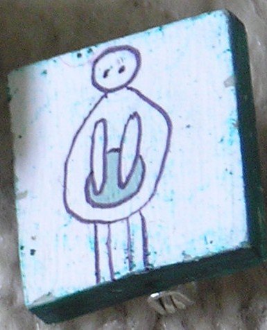 holding a hole badge