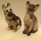 Siamese cat and German sheperd figurines