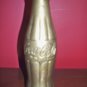 brass coca cola bottle