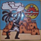 Kokopellis hanglazed ceramic tile