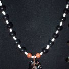 "Left-Handed" Black Agate Necklace with Black, White and Bronze Heart Pendant
