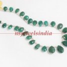 Handcrafted natural emerald gemstone with silver string