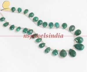 Handcrafted natural emerald gemstone with silver string