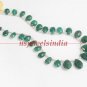 Handcrafted natural emerald gemstone with silver string