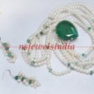 Magnificent pearl & emerald gemstone with silver string