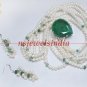 Magnificent pearl & emerald gemstone with silver string