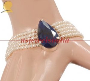 Pear shape sapphire gemstone clasp & pearl bracelet
