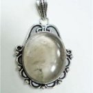 14.81gms natural smokey color stone & silver pendant