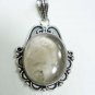 14.81gms natural smokey color stone & silver pendant