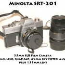 Minolta SRT-201 35mm SLR Film Camera  45mm Lens, snap cap, 49mm sky filter,  cap keeper  135mm lens