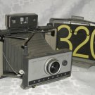 Polaroid 320 Instant Film Folding Land Camera tested works with book