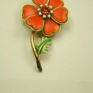 Fun bright orange Vintage pin with orange rhinestone center