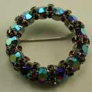 Vintage Aurora Borealis Ruby Wreath style pin, signed Warner