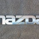 OEM Mazda Body/Dash/Trunk Emblem. 15.8cm