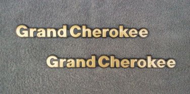 OEM Jeep Grand Cherokee Body/Dash Emblems. RARE Gold Color!
