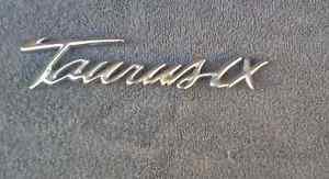 OEM Ford Taurus LX Body/Dash Emblem