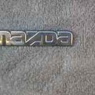 OEM Mazda Body/Dash/Trunk Emblem. 9cm