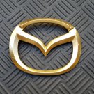 OEM Mazda Body/Dash/Trunk Emblem. RARE gold color! 10.5cm