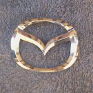 OEM Mazda Body/Dash/Trunk Emblem. 7.5cm Curvature for trunk fit!