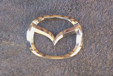 OEM Mazda Body/Dash/Trunk Emblem. 7.5cm Curvature for trunk fit!