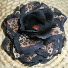 Leopard print on black rose