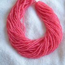 Yellow Coral color lined Czech seedbead hank 10/0