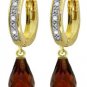 DD-3410W: 14K. WHITE GOLD DIAMONDS HUGGIE EARRING WITH GARNETS