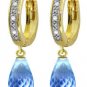 DD-3408W: 14K. WHITE GOLD DIAMONDS HUGGIE EARRING WITH BLUE TOPAZ