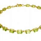 DD-1510Y: 14K SOLID GOLD TENNIS BRACELET W/ NATURAL PERIDOTS