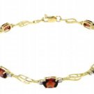 DD- 1523Y: 14K. GOLD TENNIS BRACELET W/ NATURAL GARNETS & DIAMONDS