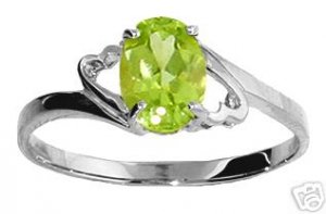 DD-1322W: 14K. SOLID WHITE GOLD RING WITH  NATURAL OVAL PERIDOT