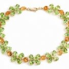 DD-1634Y: 14K. GOLD TENNIS BRACELET W/NATURAL  PERIDOT & CITRINE
